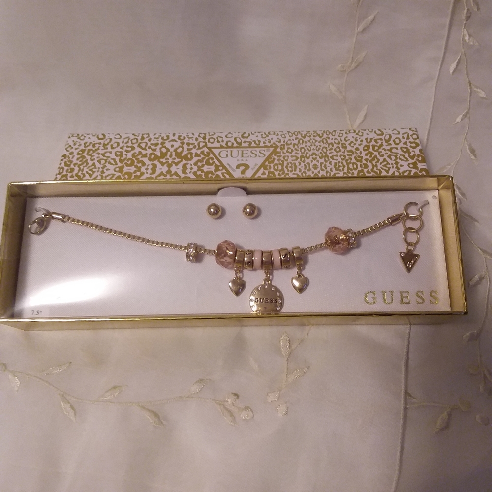 Gold Tone Pink Bead bracelet Guess